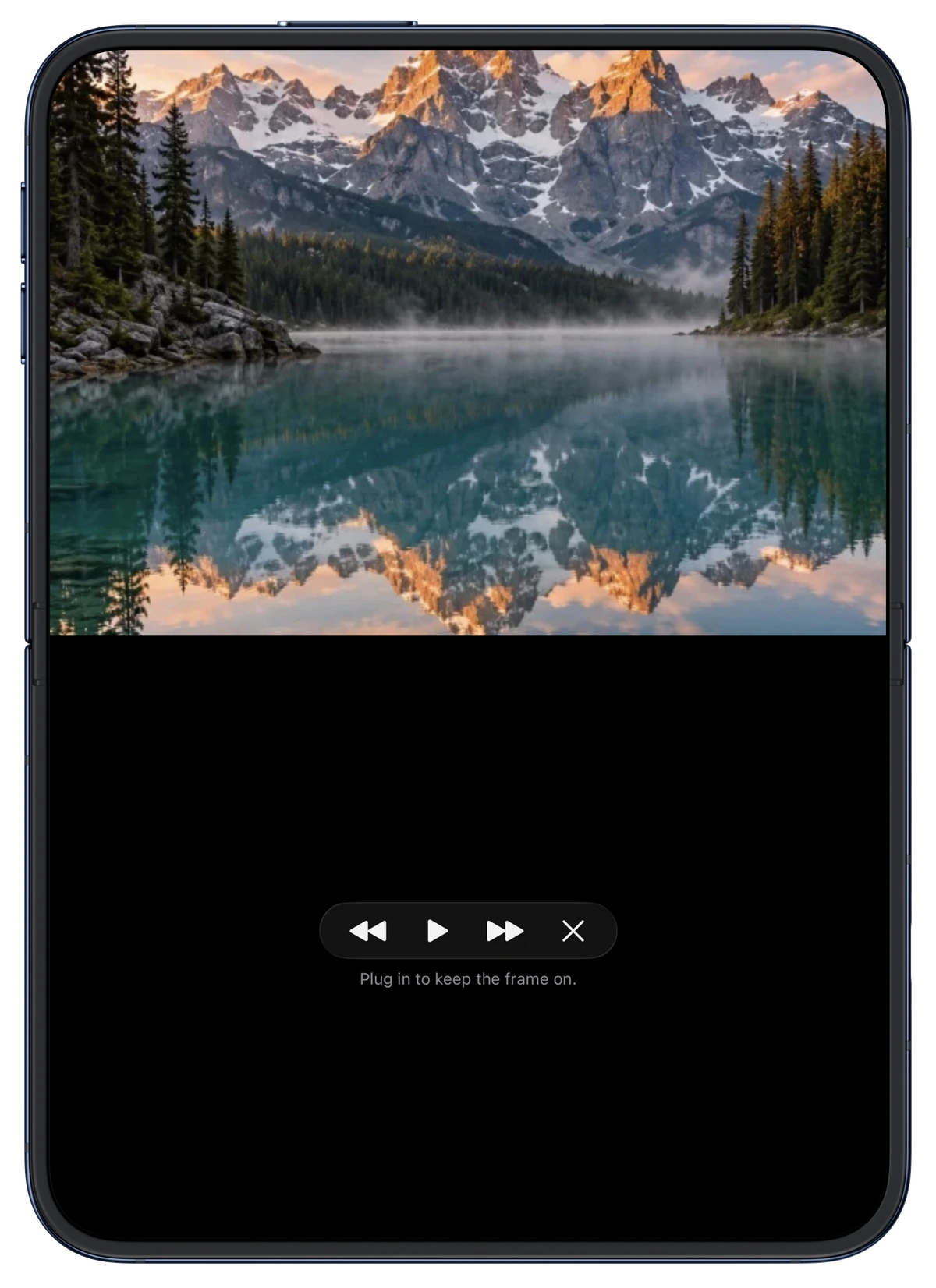 Frame mode with a mountain lake above the playback controls on the open iPhone Duo